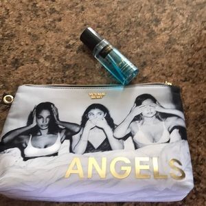 Victoria Secret makeuo bag and aqua kiss